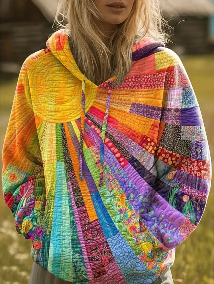 Sara, Sudadera patchwork multicolor con capucha de Zelira