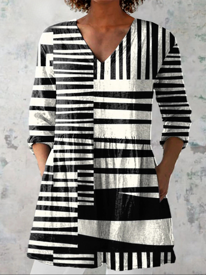 Capri, Blusa larga con escote en V de Zelira