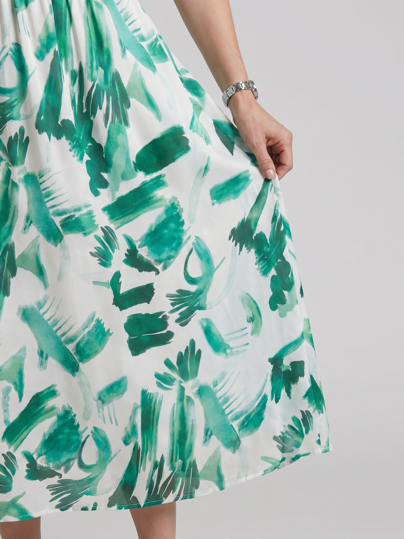 Paula | Vestido midi con mangas abullonadas y escote de pico
