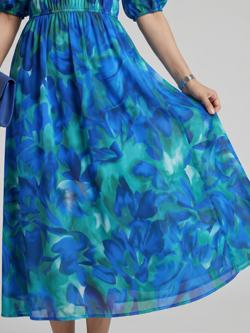 Paula | Vestido midi con mangas abullonadas y escote de pico
