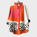 Blusa statement – corte holgado con diseño artístico