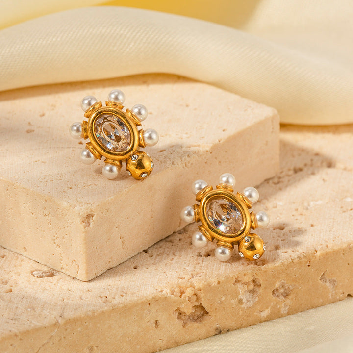 Pendientes elegantes de oro con una perla - Zelira