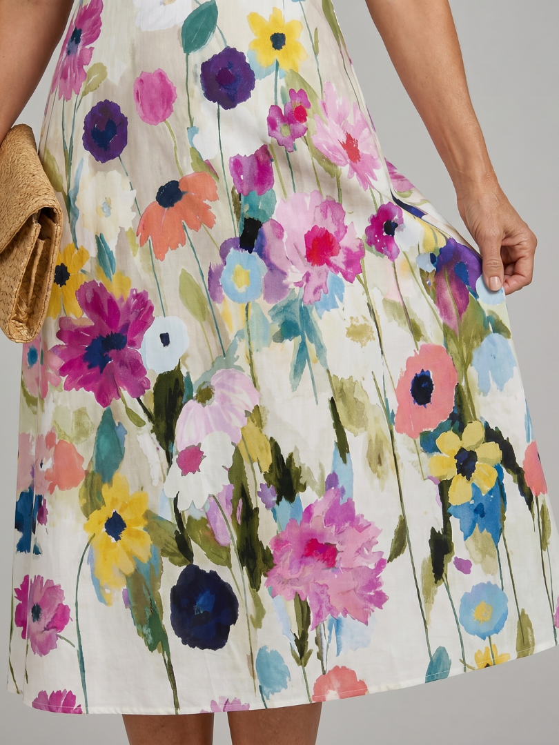Emilia | Vestido midi floral sin mangas con cuello redondo