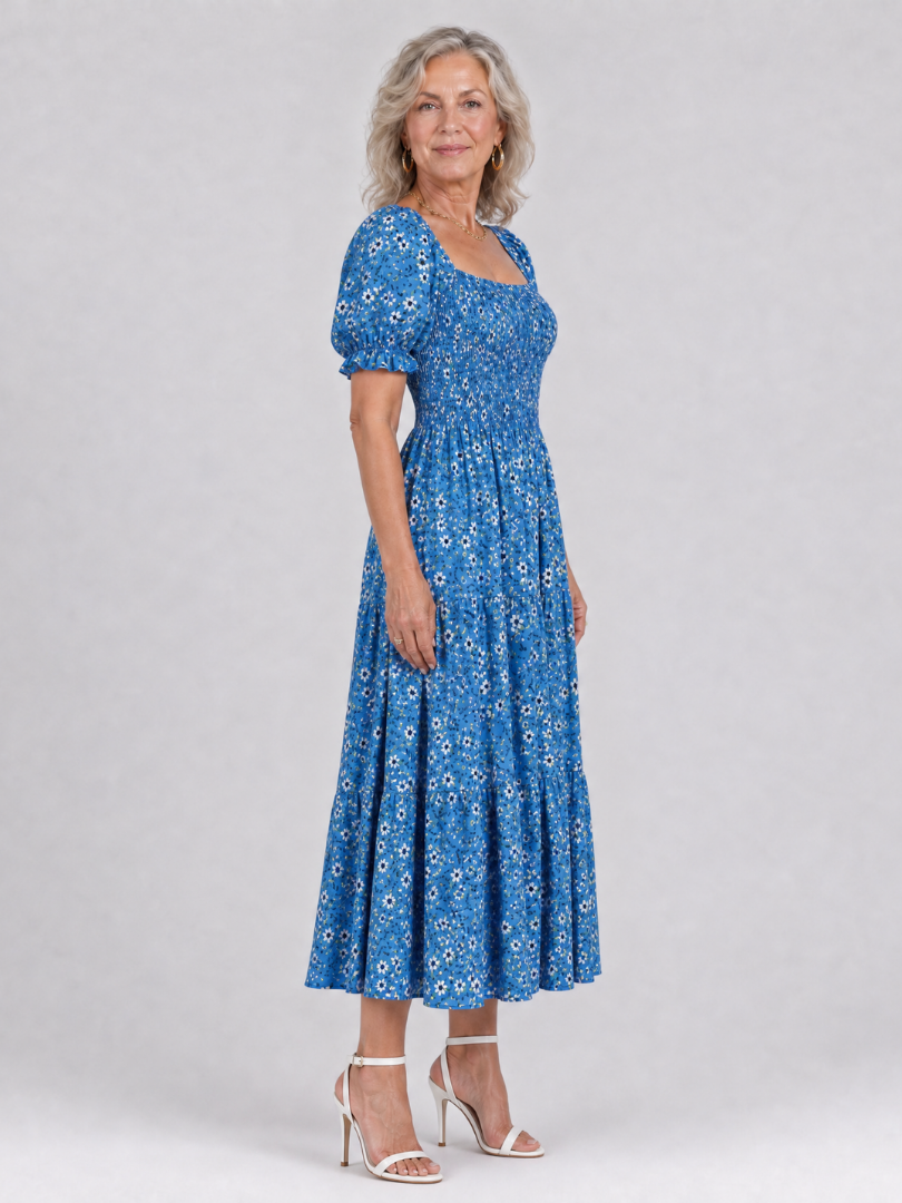 Greta | Vestido midi floral con cuerpo fruncido